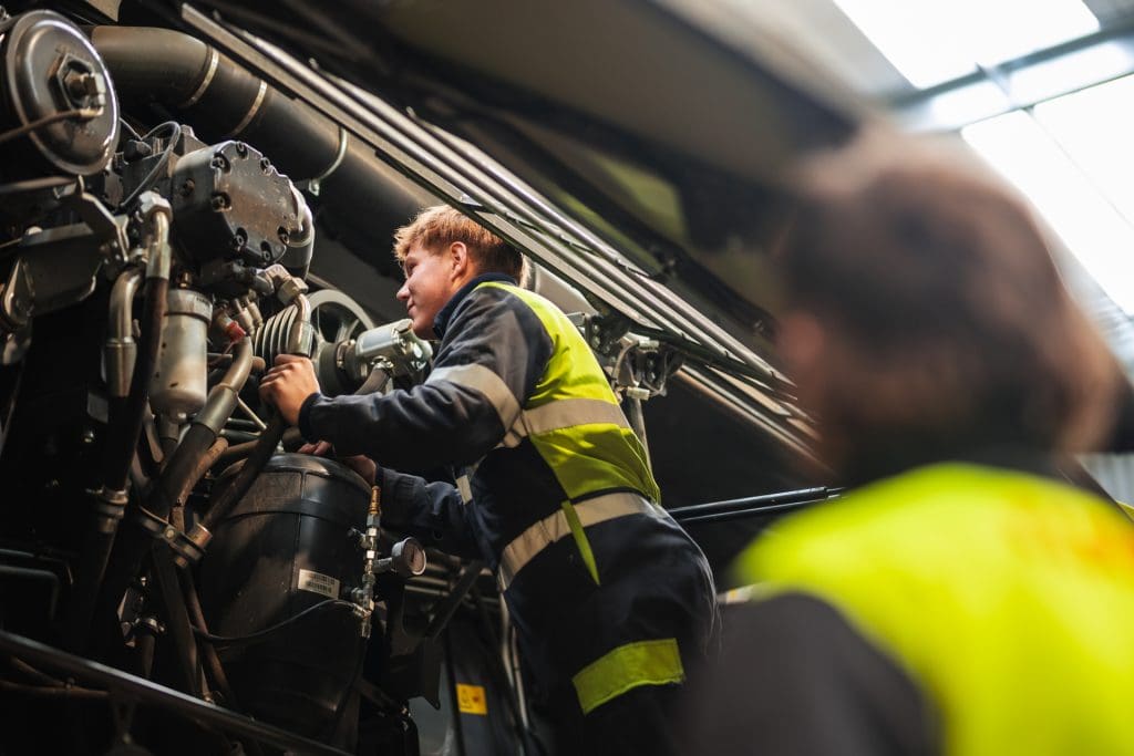 service technicians reviewing a machine